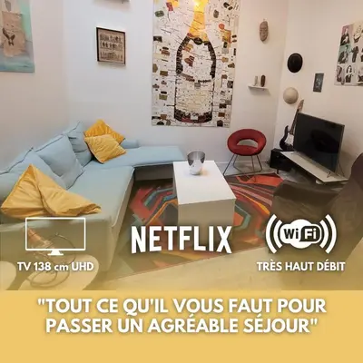 Télévision ou salle de divertissement dans l'établissement Gite Urbain - Nabu