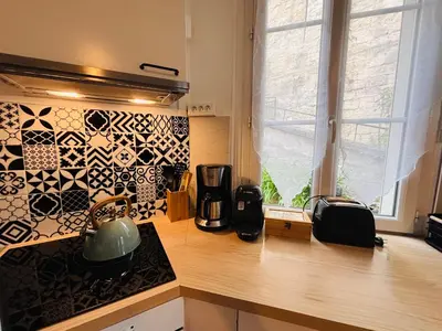 Cuisine ou kitchenette dans l'établissement L'inattendue