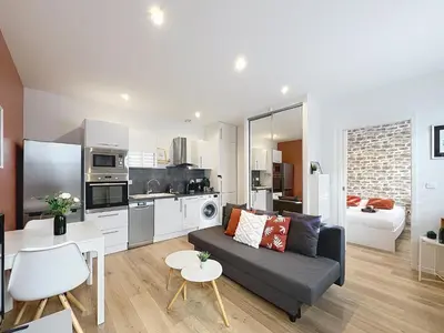 Cuisine ou kitchenette dans l'établissement Le Rémois - Charmant T2 - Rénové - Parking - Cour privative - WIFI