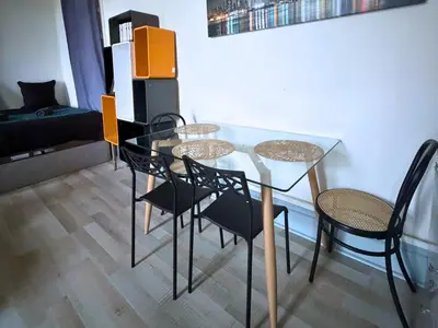 Coin salon dans l'établissement L'Aparté - Studio Centre - 4 Personnes