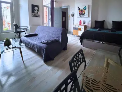 Coin salon dans l'établissement L'Aparté - Studio Centre - 4 Personnes