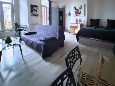 Coin salon dans l'établissement L'Aparté - Studio Centre - 4 Personnes
