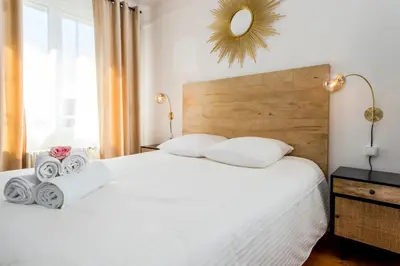 Un ou plusieurs lits dans un hébergement de l'établissement Suites Mana - Le Manaloft, Chic et moderne avec salle privée de Fitness en plein centre-ville de Rethel