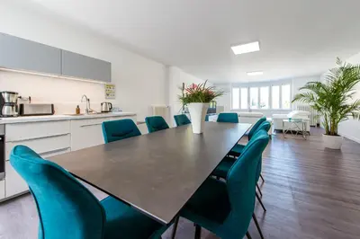 Cuisine ou kitchenette dans l'établissement Suites Mana - Le Manaloft, Chic et moderne avec salle privée de Fitness en plein centre-ville de Rethel