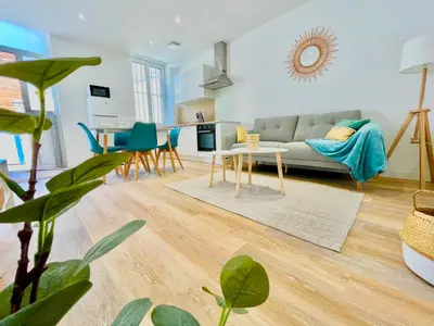 Coin salon dans l'établissement *ARENA* - duplex lumineux