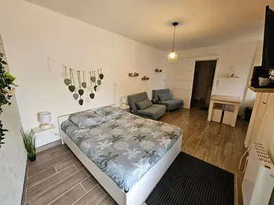 Coin salon dans l'établissement Maisonnette du Relais de Vauchamps