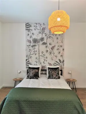 Un ou plusieurs lits dans un hébergement de l'établissement Appartement La palette