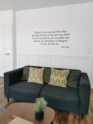 Coin salon dans l'établissement Appartement La palette