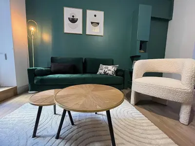 Coin salon dans l'établissement CK Suite & Spa - Jacuzzi Privatif - Reims