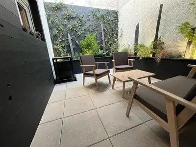 Coin salon dans l'établissement CK Suite & Spa - Jacuzzi Privatif - Reims