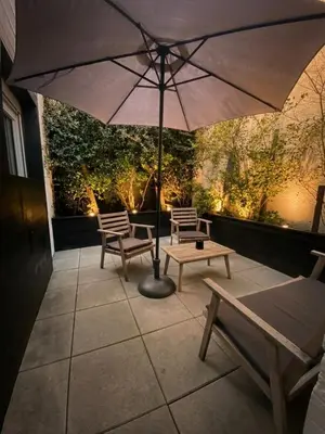 Coin salon dans l'établissement CK Suite & Spa - Jacuzzi Privatif - Reims