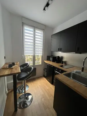 Cuisine ou kitchenette dans l'établissement Reims Blue Sky