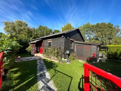 Jardin de l'établissement Cottage tres bien équipé avec jacuzzi