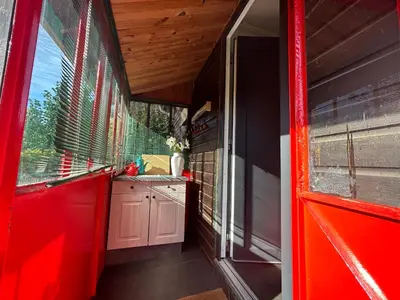 Cuisine ou kitchenette dans l'établissement Cottage tres bien équipé avec jacuzzi