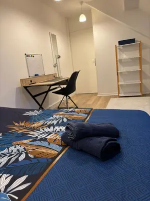 Coin salon dans l'établissement Appartement spacieux et élégant