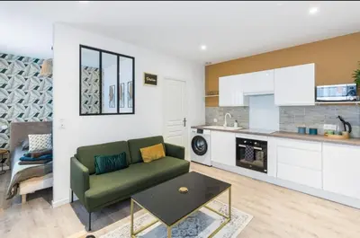 Cuisine ou kitchenette dans l'établissement Désirée Logement Cosy et Charmant 1 er étage