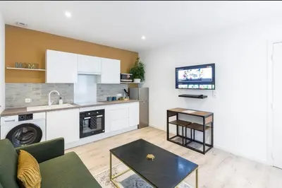 Cuisine ou kitchenette dans l'établissement Désirée Logement Cosy et Charmant 1 er étage
