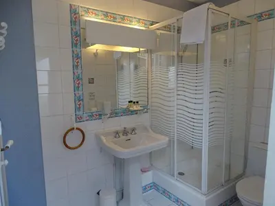 Salle de bains dans l'établissement La Maison Blanche