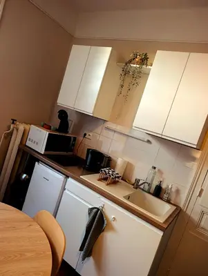 Cuisine ou kitchenette dans l'établissement Le Cocon Rethelois.
