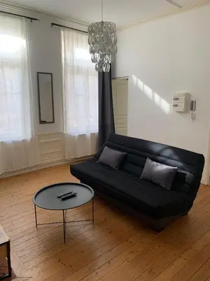 Coin salon dans l'établissement Le Voltaire 4 chez Adrien Hyper centre