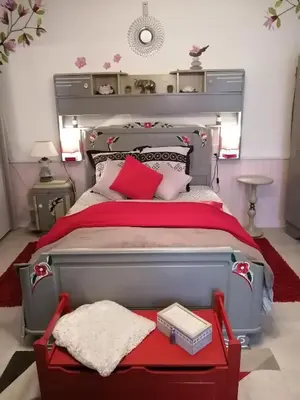 Un ou plusieurs lits dans un hébergement de l'établissement Maison cocoon et chaleureuse