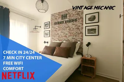 Un ou plusieurs lits dans un hébergement de l'établissement Nouveau* Vintage Mecanic* Wifi*Netflix*Confort
