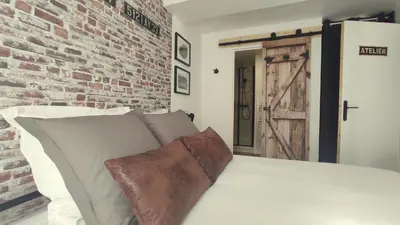 Un ou plusieurs lits dans un hébergement de l'établissement Nouveau* Vintage Mecanic* Wifi*Netflix*Confort