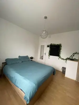 Un ou plusieurs lits dans un hébergement de l'établissement Le Ranch - chambres d'hôtes - proche centre ville