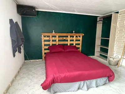 Un ou plusieurs lits dans un hébergement de l'établissement Le Ranch - chambres d'hôtes - proche centre ville