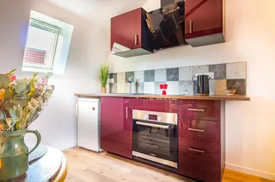 Cuisine ou kitchenette dans l'établissement Jacuzzi® - La petite Romantique - FloBNB