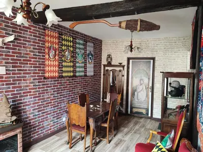 Télévision ou salle de divertissement dans l'établissement Le Dortoir d'Harry Potter