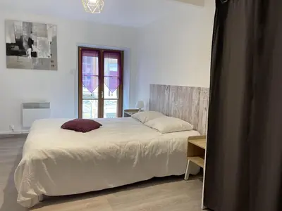 Un ou plusieurs lits dans un hébergement de l'établissement Les Gîtes de Monthermé La Maison authentique du centre historique