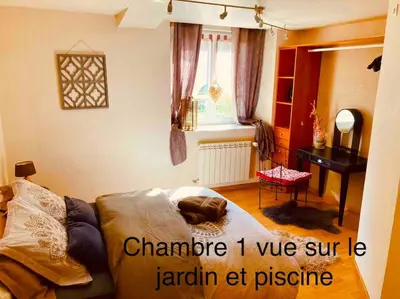 Coin salon dans l'établissement Chez Lilly & Cie 10 à 12 personnes avec sauna et piscine