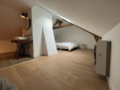 Un ou plusieurs lits dans un hébergement de l'établissement Gîte le Presbytère de Blérancourt