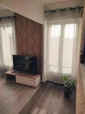 Télévision ou salle de divertissement dans l'établissement Superbe appartement bien placé