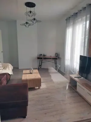 Coin salon dans l'établissement Superbe appartement bien placé