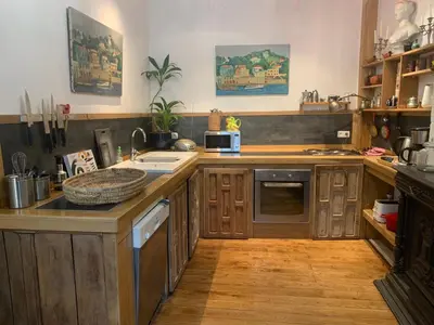 Cuisine ou kitchenette dans l'établissement La petite maison