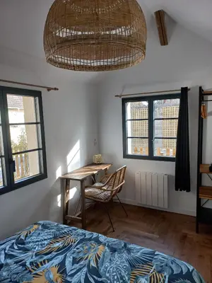 Un ou plusieurs lits dans un hébergement de l'établissement Villa Cosy Pierrefonds