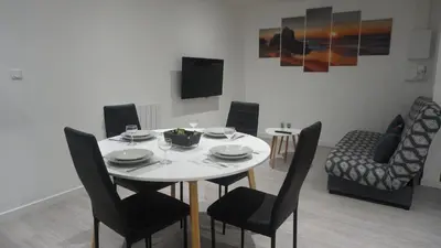 Coin salon dans l'établissement Grand T2 Jardin Wifi Parking Proche Gare
