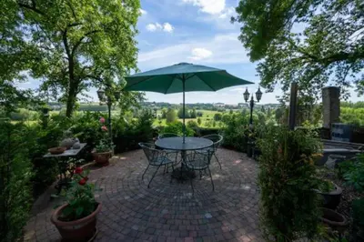 Jardin de l'établissement Vakantiewoning Le Chêne