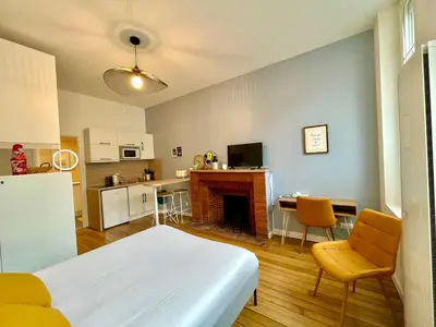 Cuisine ou kitchenette dans l'établissement Suite Clovis - 1