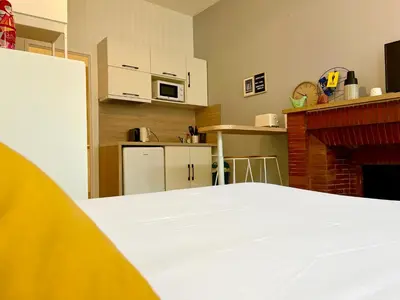 Cuisine ou kitchenette dans l'établissement Suite Clovis - 1