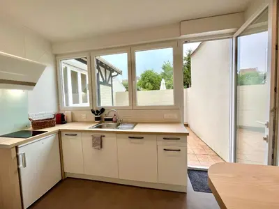 Cuisine ou kitchenette dans l'établissement Suite Clovis 2