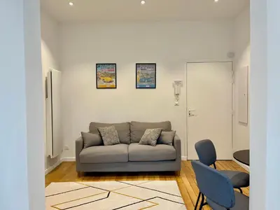 Coin salon dans l'établissement Suite Clovis 2