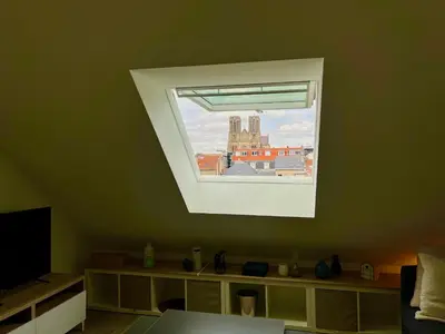 Télévision ou salle de divertissement dans l'établissement Suite Clovis 7