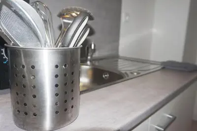 Cuisine ou kitchenette dans l'établissement Atypique T1 Duplex - WIFI .Parking .Proche .Gare