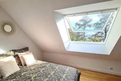 Un ou plusieurs lits dans un hébergement de l'établissement Loft les deux cèdres avec vue panoramique
