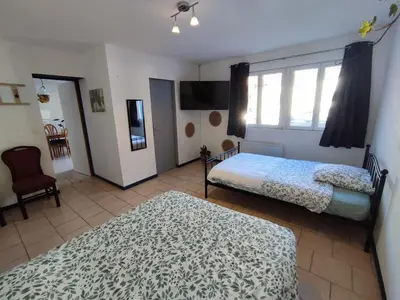 Un ou plusieurs lits dans un hébergement de l'établissement Maison individuelle 60 m²