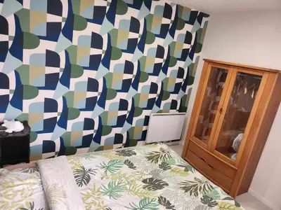Un ou plusieurs lits dans un hébergement de l'établissement Maison de campagne