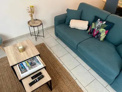Coin salon dans l'établissement Appartement au calme - Proche centre ville